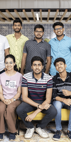 Intuit India employees smiling at the camera